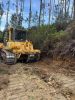 Limpeza e alargamento de caminhos florestais em Fermedo
